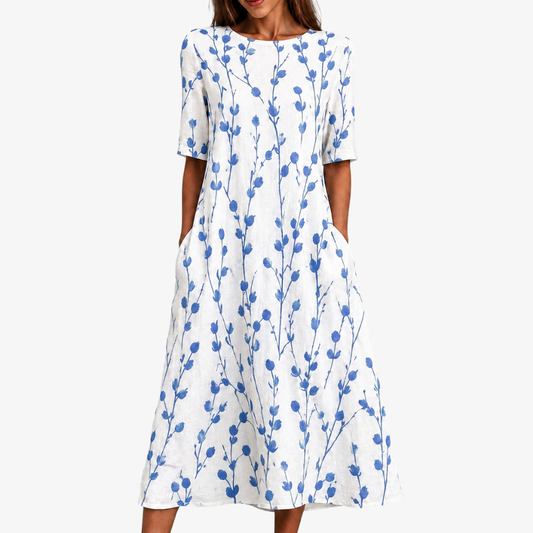 Cielo | Vestido midi brisa floral azul pradera con bolsillos