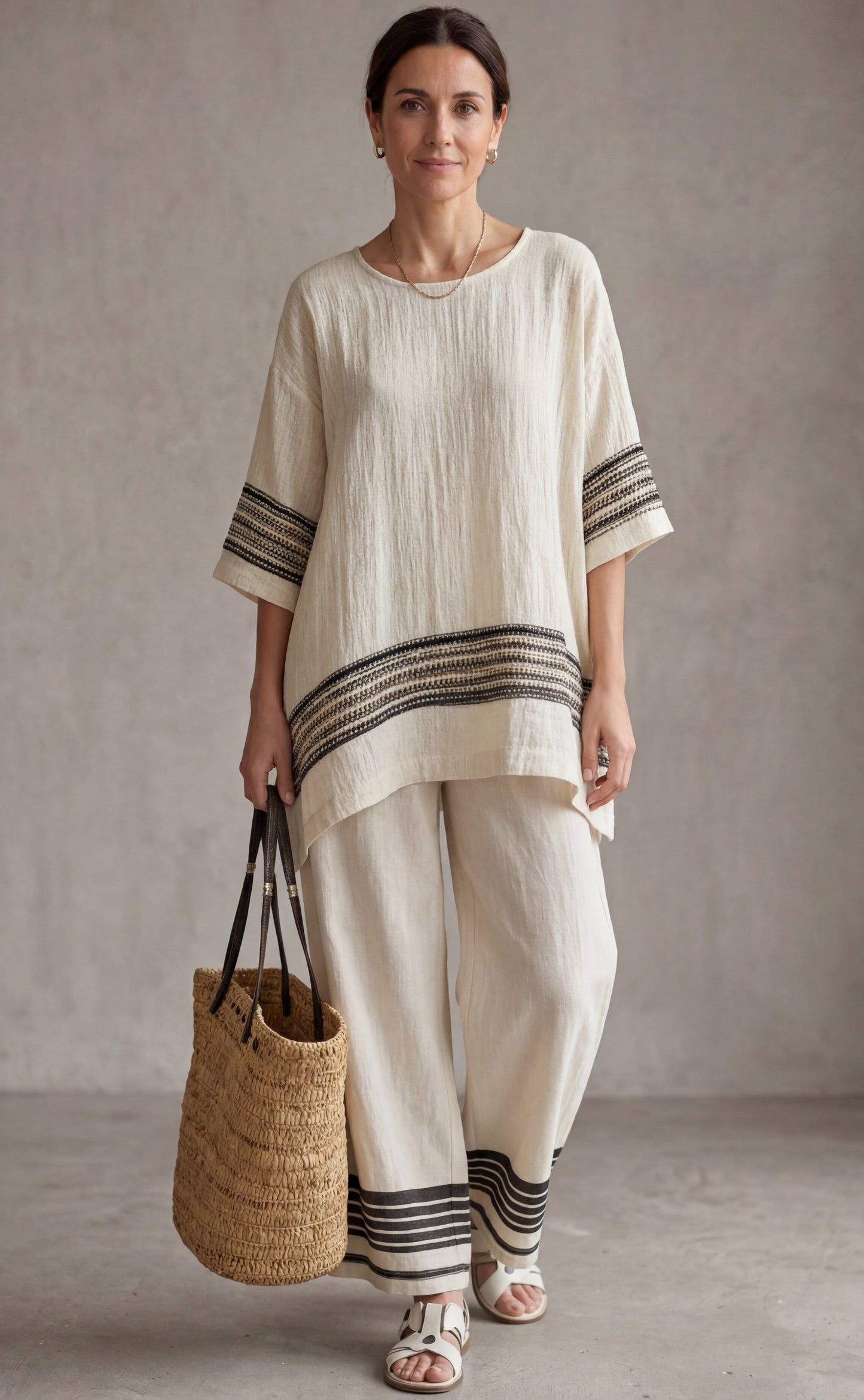 Mariella | Top elegante de lino con rayas negras y pantalones fluidos